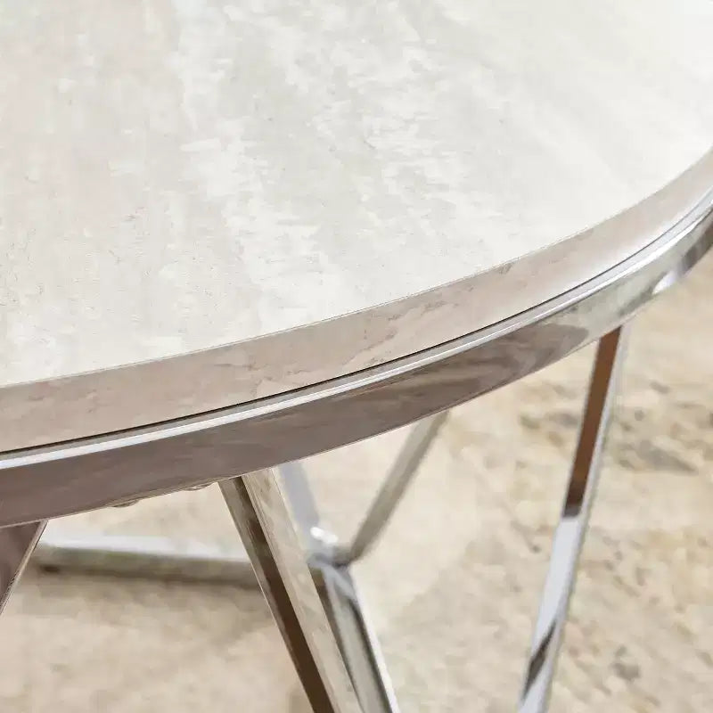 Table basse ronde en fausse pierre argentée