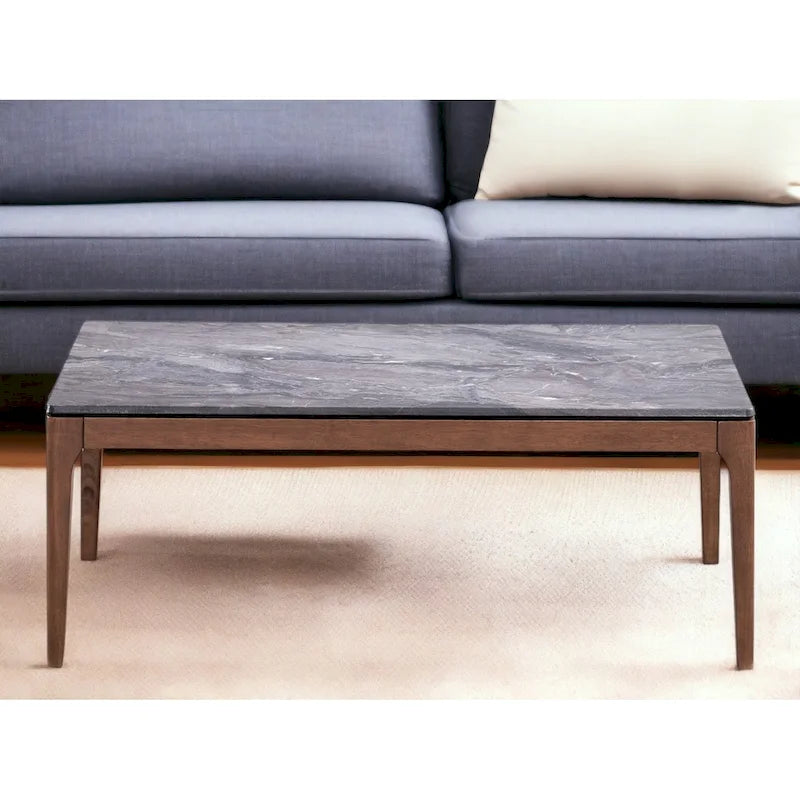Table basse en pierre grise et noyer massif