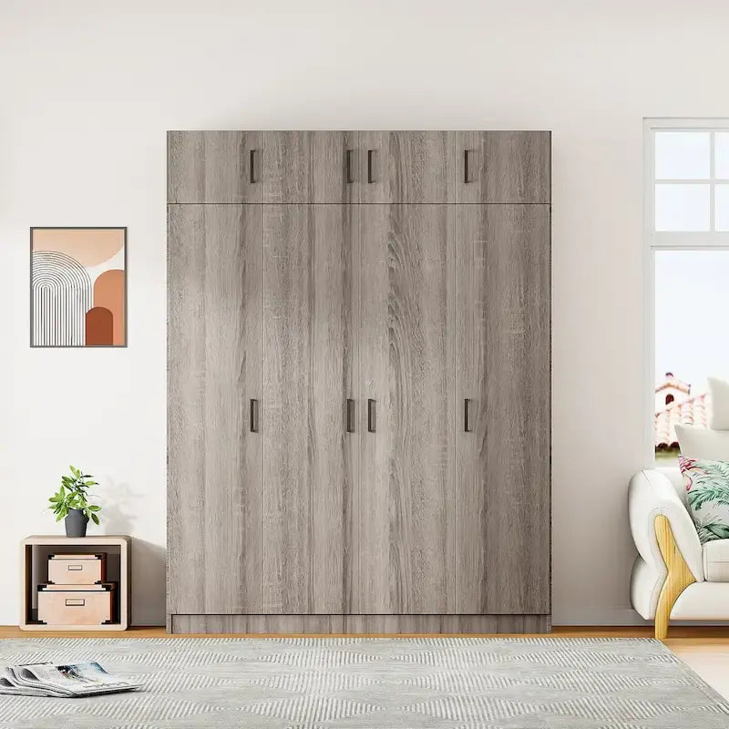 Armoire avec plusieurs rangements et un élément haut.